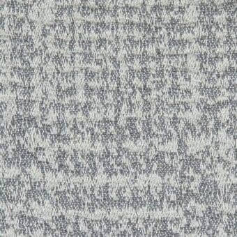 Porada Motley fabric 811, gray and off-white woven textile, dense irregular weave with granular texture and visible threads.