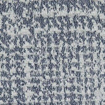 Woven fabric texture, gray and navy blue, dense mottled pattern with tweed-like weave and subtle tonal variations.