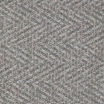 Porada Ikat fabric sample, woven gray textile, heathered pattern with beige and charcoal threads, dense matte texture.