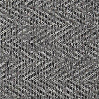 Ikat fabric texture, gray and off-white tones, dense diagonal weave with visible thread intersections, Porada collection code 13696 54.