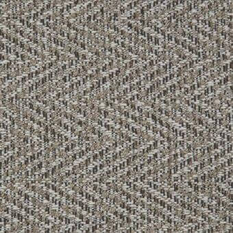 Porada Ikat fabric sample, woven gray and beige textile, dense irregular pattern with tonal earthy shades and structured raised weave.