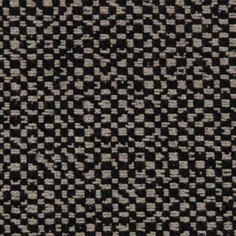 Woven ikat fabric sample, charcoal gray and beige, dense irregular square pattern with coarse texture, Porada L1575.