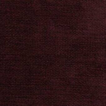 Porada fabric sample, dark brown woven texture, dense granular pile with matte finish and subtle tonal variations.