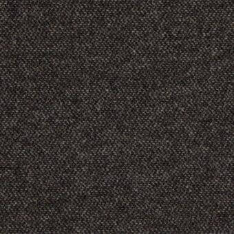 Charcoal gray herringbone serge fabric (c) 089 by Porada, featuring a dense weave with beige and cream flecks and a matte finish.