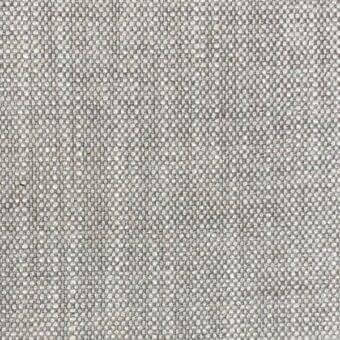 Heathered gray woven fabric texture with raised granular dots, matte finish; “Silesia” label, Porada fabrics collection.