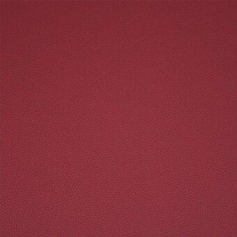 Deep red eco-leather texture with a fine, uniform grain and subtle sheen, displaying a smooth, dense, and durable surface.