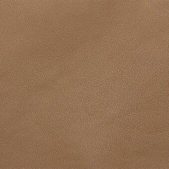 Tan leather texture with granular surface, matte finish, and subtle tonal variations creating a slightly pebbled, warm caramel tone.