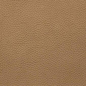 Leather texture sample, medium-brown, with repeating circular indentations and radiating fine lines, matte finish, Porada regular grade.