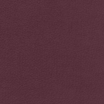 Potocco Flamingo Bordeaux fabric, muted burgundy textile with granular texture and matte finish, suitable for indoor upholstery.