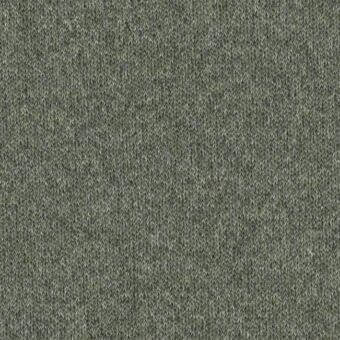 Salvia green woven fabric texture, dense heathered knit, matte finish, speckled tonal variations, “cortina a9b salvia” label visible.