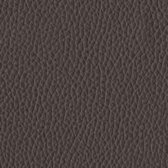 Geo leather dark brown covering features a repeating geometric polygon pattern, matte finish, dense texture, studio shot.