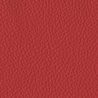 Geo leather rosso p1v texture sample features a repeating geometric pattern in deep red with a matte, pebble-like surface and dimensional effect.