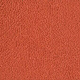 Terracotta leather texture with repeating polygonal pattern, warm earthy tones, embossed surface, and subtle tonal variations for upholstery.