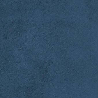 Nabuk leather sample, deep blue, mottled texture with fine cracks, velvety finish, even lighting, uniform background, Potocco coverings collection.
