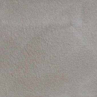 Nabuk leather texture, Tortora E2T color, soft velvety surface with granular pattern, matte finish, muted warm gray-beige tone, Potocco coverings.