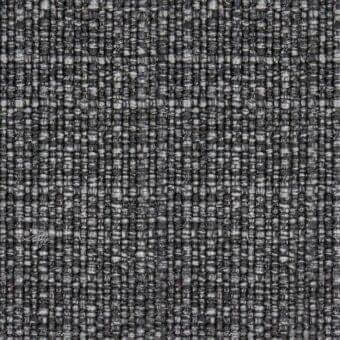 Dark gray woven fabric texture, “Soul Nero Zw” from Potocco Coverings, displays a heathered, multi-directional grid pattern with a matte finish.