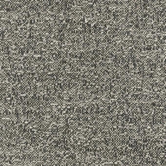Woven fabric sample in grayscale tones displays a dense, irregular texture with blended dark gray and off-white threads; outdoor textile.