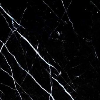 Nero Marquinia marble texture displaying black stone with irregular white veins, polished finish, and high contrast pattern.