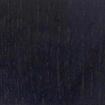 Carbon-stained ash HP wood sample displaying a dark, matte finish with prominent vertical grain and subtle tonal variations.