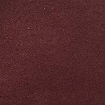 Presotto fabric sample, reddish-brown woven texture, granular surface with tonal variations, identified as f bls373.