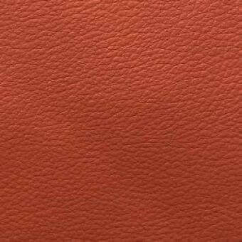 Terracotta faux leather texture with a matte finish and fine granular pattern, displaying a consistent warm burnt orange tone and soft, pliable quality.