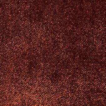 Reddish-brown fabric sample with granular texture, speckled with copper flecks, displaying a woven, slightly pebbled surface; labeled “presotto g fx061”.