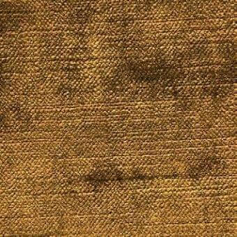 Golden-brown fabric texture displaying a dense, horizontal weave with subtle tonal variations and a slightly mottled, linear pattern.