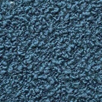 Presotto fabric texture, deep teal looped pile, dense nubby surface with consistent short height and subtle mottled tone.