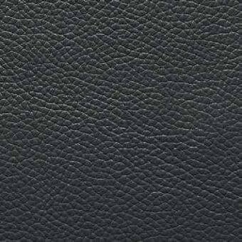 Presotto leather texture, dark gray “grigio fumo 9q”, densely pebbled grain with irregular indentations and a consistent matte finish.