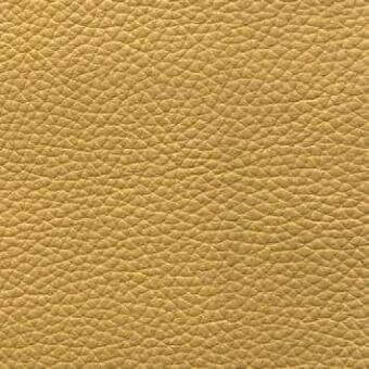 Presotto leather texture, warm yellow-gold “miele 450”, dense pebble-grain pattern with matte finish and consistent color distribution.