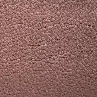 Leather texture sample, dusty rose color, dense bumpy grain, matte finish, compact surface, neutral background, natural tonal variations.