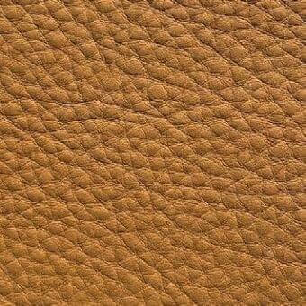 Golden-brown pebble-grain leather texture, dense packed grain with subtle tonal variations, durable upholstery material, Presotto “New Heavy” XTHY43044.