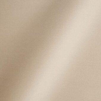 Beige fabric texture with vertical grain pattern, embossed text reading “reflex > fabric > amsterdam > grain,” and subtle sheen.