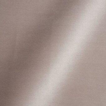 Taupe and gray fabric texture with subtle sheen, displaying a flowing pattern and vertical light band; includes text “reflex fabric Amsterdam”.