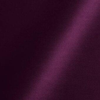 Plum fabric swatch with matte finish, displaying woven texture and diagonal highlight; Reflex Amsterdam 79 Loulou textile sample detail.