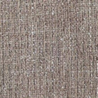 Woven fabric texture, gray-brown with speckled variation, tight irregular weave, “reflex dublino crocodile” marking visible, tactile quality.