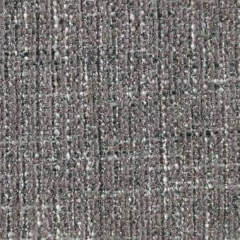 Heathered gray woven textile with a nubby texture, displaying vertical lines and a speckled pattern; identified as “dublino trout” fabric.