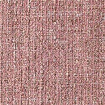 Textured fabric sample in dusty rose and terracotta tones with speckled gray and off-white particles, displaying a rough, granular surface.