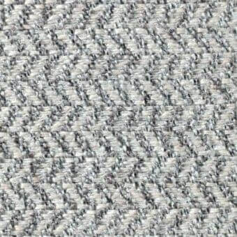 Ginevra fabric sample, light gray herringbone weave, dense textured surface with matte finish suitable for upholstery applications.