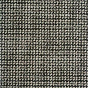 Houndstooth fabric sample, off-white and charcoal gray, dense weave with interlocking motifs; Reflex Carnaby Street Dolphin textile.