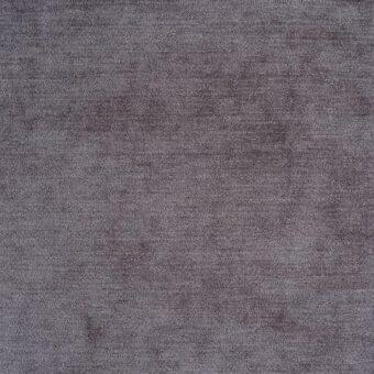 Gray-purple fabric texture with a dense, short pile and consistent weave, displaying subtle tonal variations and a velvety surface; label reads “reflex.”