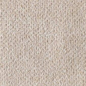 Beige woven fabric texture with granular appearance, tight uniform weave, and subtle raised surface; manufacturer imprint visible.