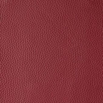 Deep red leather texture sample with a fine grain, matte finish, and interwoven surface; “Reflex colorata 132 rosso” upholstery material.