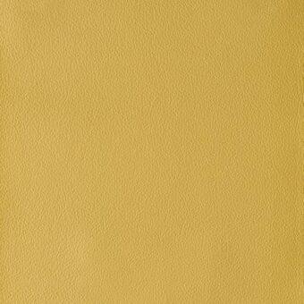 Ochre leather texture sample with fine grain, exhibiting a matte finish and subtle tonal variations; identified as “colorata 136 ocra”.