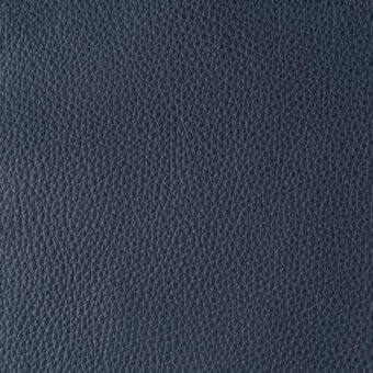 Dark gray pebble-grain leather texture, “reflex colorata 145 blu grafite,” displays consistent, dense patterning and subtle tonal variations.
