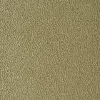 Olive-yellow leather texture sample, “colorata 155 giallo oliva,” displays a dense pebbled grain and matte finish suitable for upholstery.