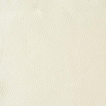 Cream leather texture with a dense, repeating circular pattern and matte finish, suggesting durability for upholstery applications.