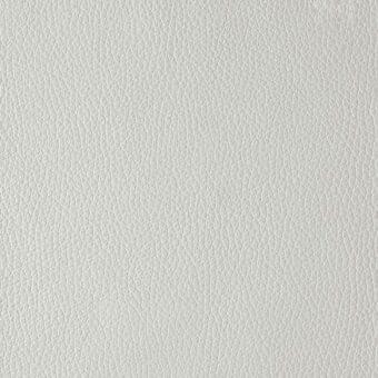 Light gray leather texture sample, “reflex titanium,” displays a matte finish with fine grain and subtle sheen, consistent color tone.