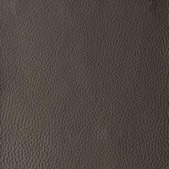 Testa di moro leather texture displaying a pebble grain pattern, with a matte finish and neutral background.