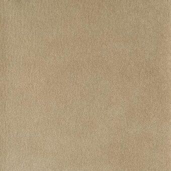Nubuk leather texture sample, warm nocciola beige color, dense short pile with subtle tonal variation and velvety appearance.